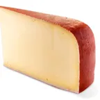 Fontina — fromage italien servi à la coupe au marché